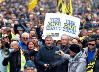 Manifestation tendue à Bruxelles contre le Pacte mondial sur les migrations